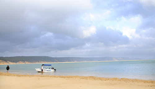 Boaties get ready to head out after unloading their vessel in to the huge lagoon that has formed at Double Island Point. Boaties get ready to head out after unloading their vessel in to the huge lagoon that has formed at Double Island Point.